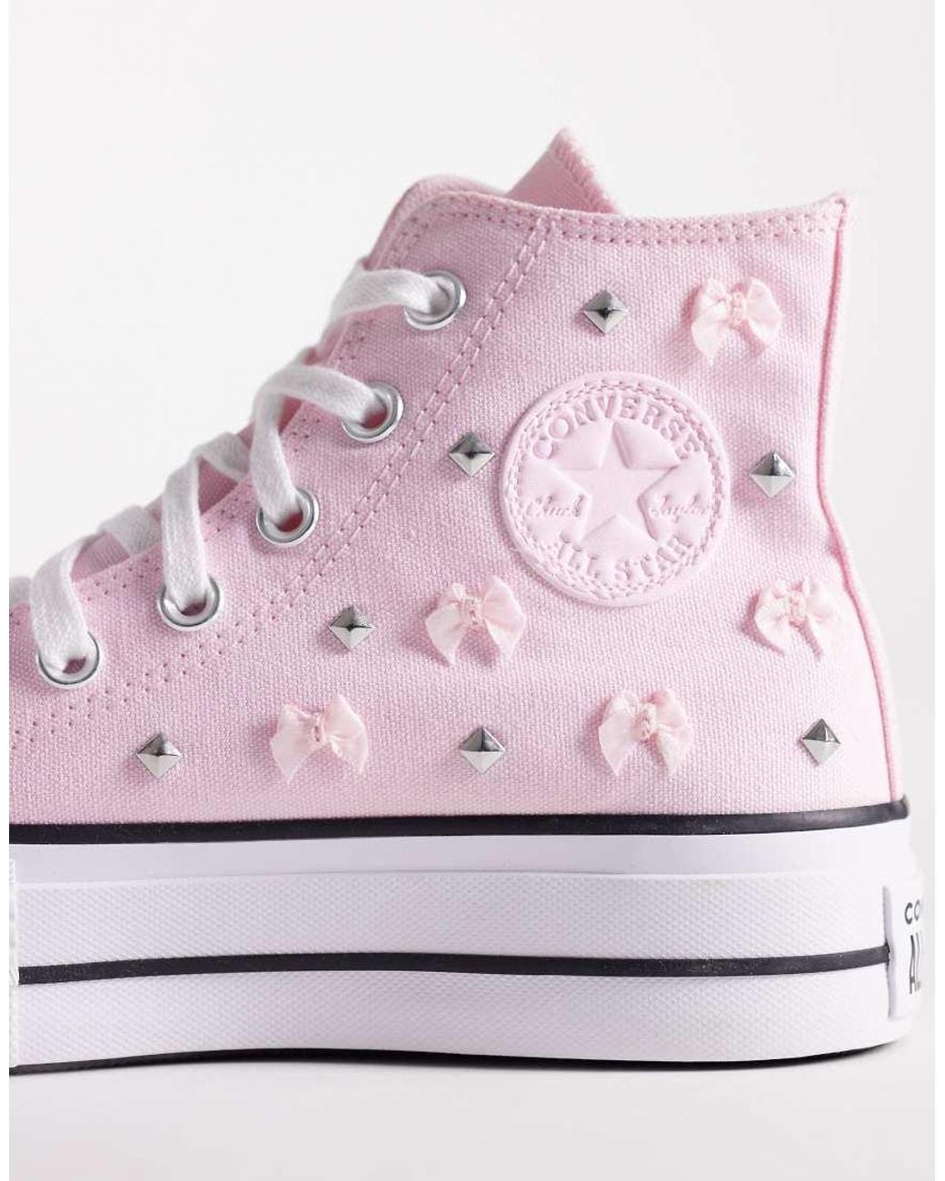 Converse Pink Chuck Taylor All Star Lift Hi Platform Sneakers With Bow And Stud Detailing