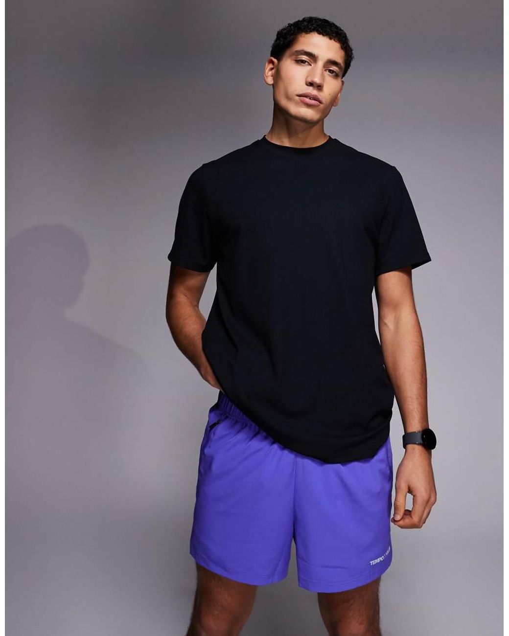 4505 Purple 3 Inch Quick Dry Split Running Shorts With Zip Pockets And Reflective Graphic for men