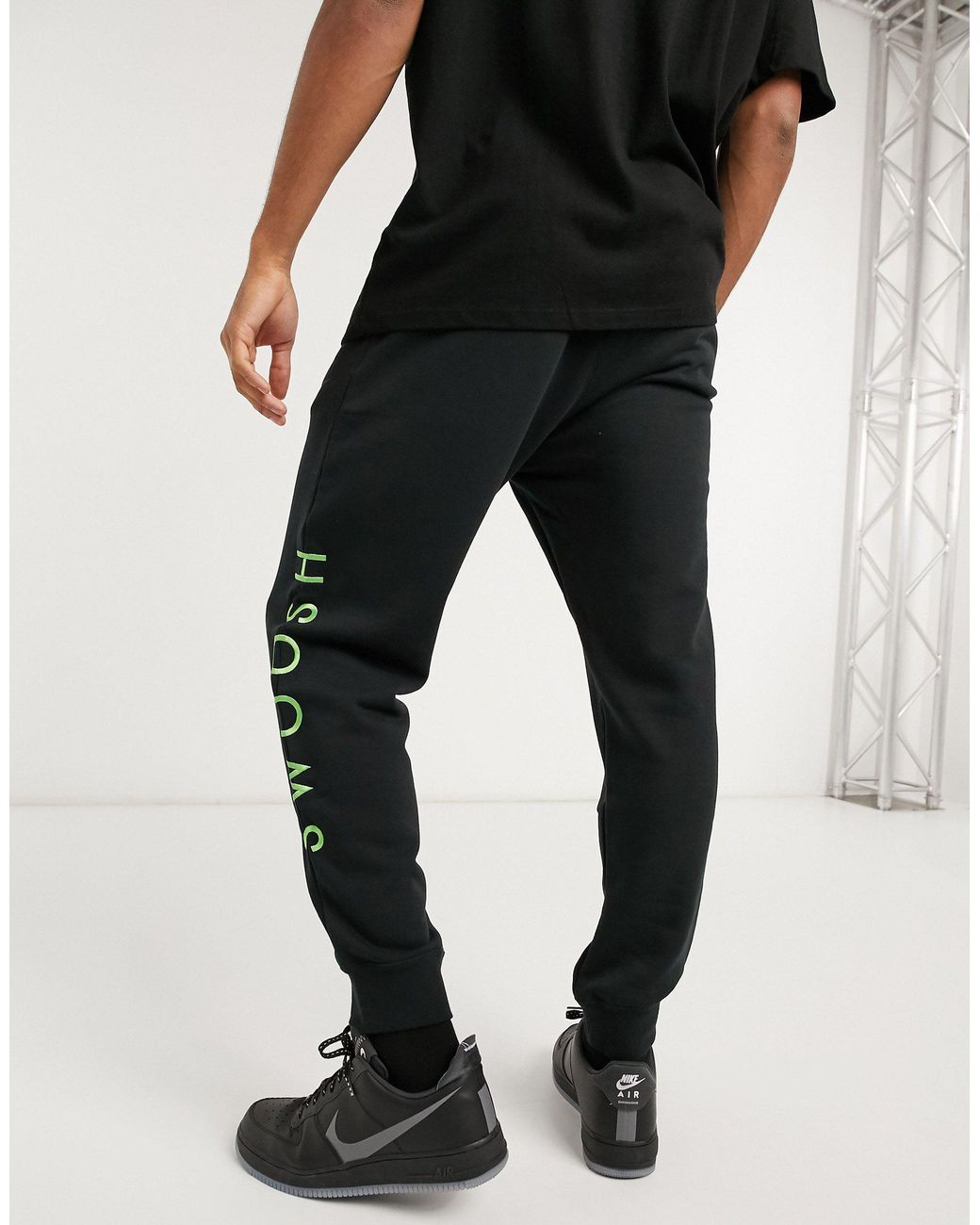 Nike Swoosh Cuffed Sweatpants in Black for Men | Lyst