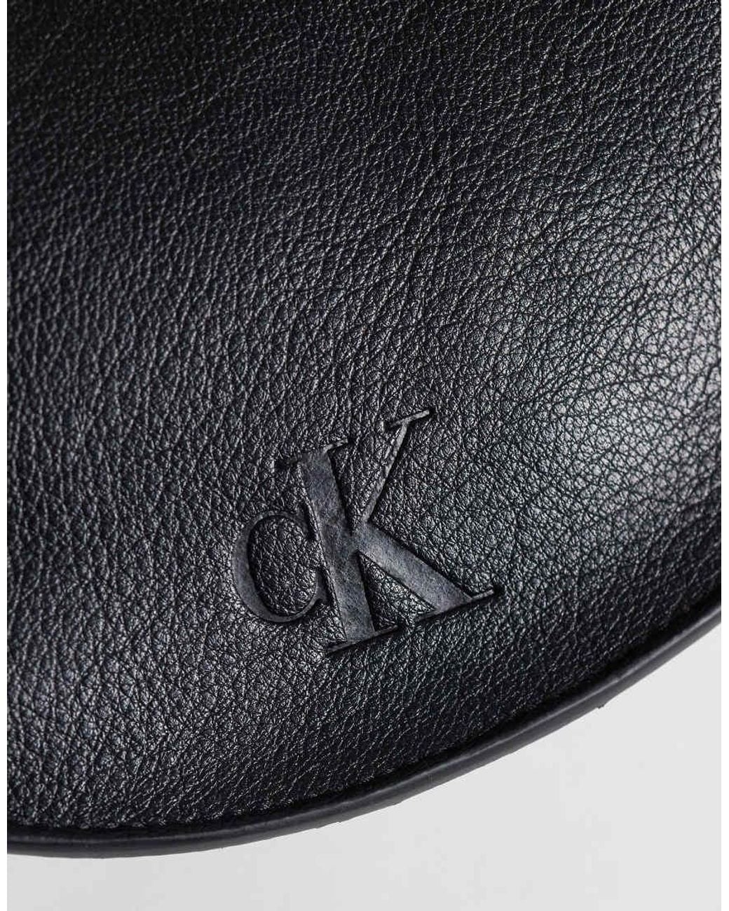 Calvin Klein Black Asymmetrical Buckle Shoulder Bag