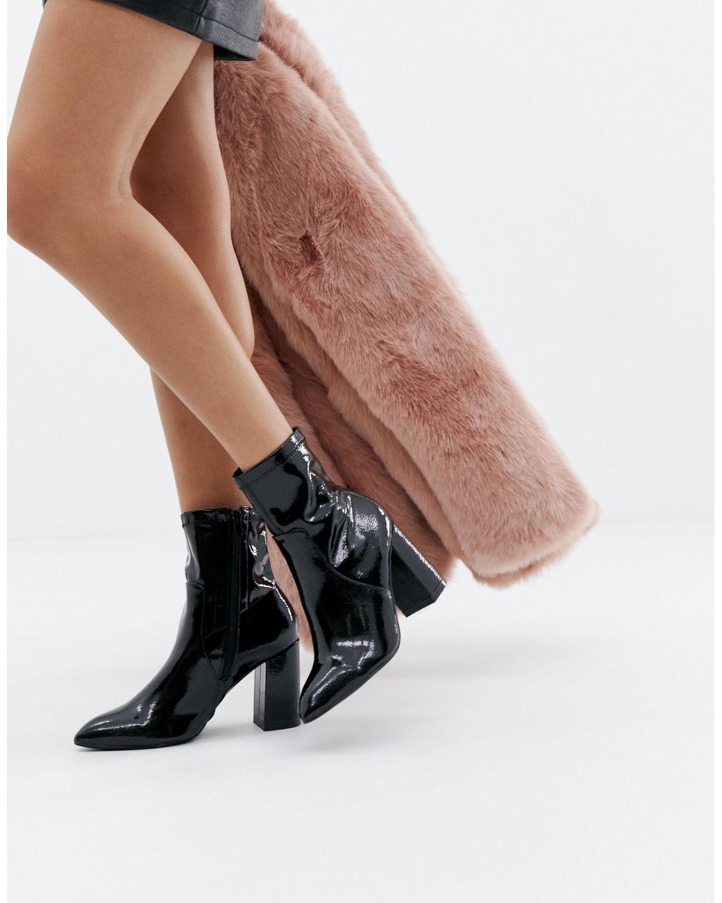 raya pointed toe ankle boots in black patent