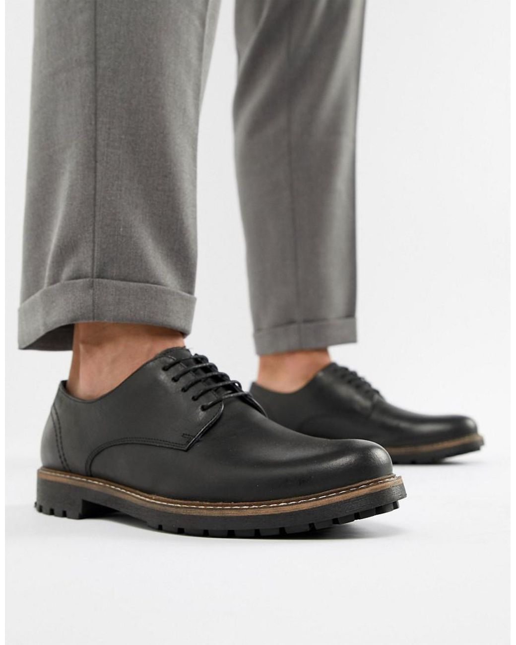 red tape black leather shoes