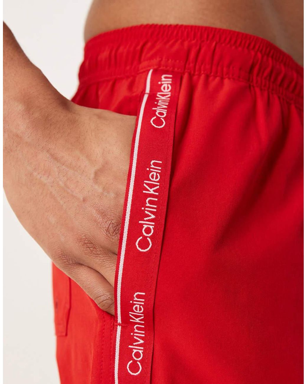 Calvin Klein Red Side Script Logo Drawstring Swim Shorts for men