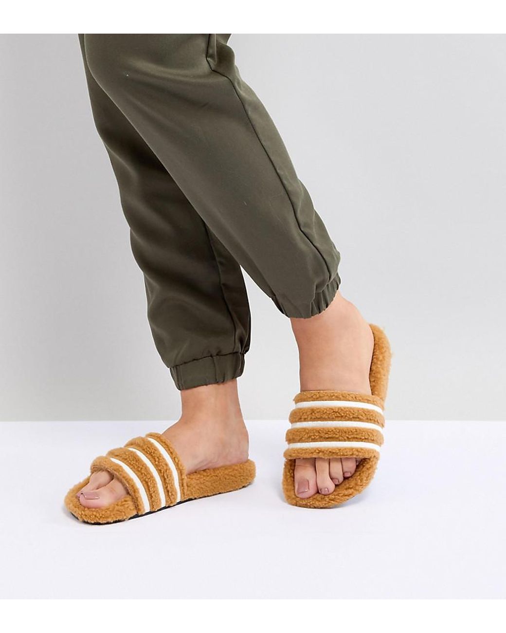 adidas Originals Adilette Furry Slider Sandals In Tan in Black | Lyst