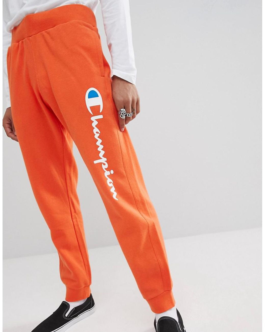 champion orange joggers