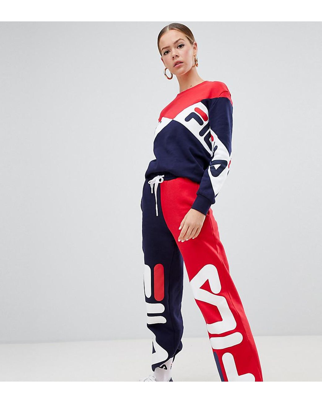 Fila Tracksuit Bottoms With Large Front Logo In Color Block Two-piece in  Red