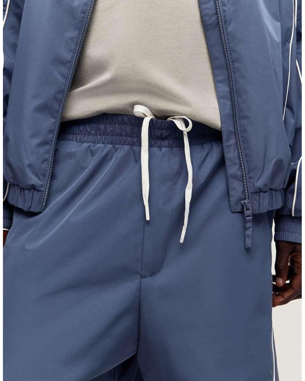 Bershka Blue Technical baggy Trousers for men