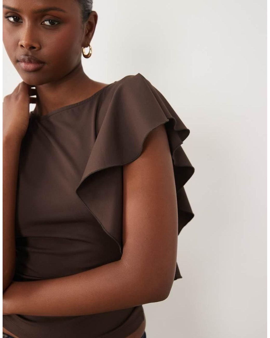The Frolic Brown Exclusive Slinky Ruffle Shoulder Detail Sleeveless Top