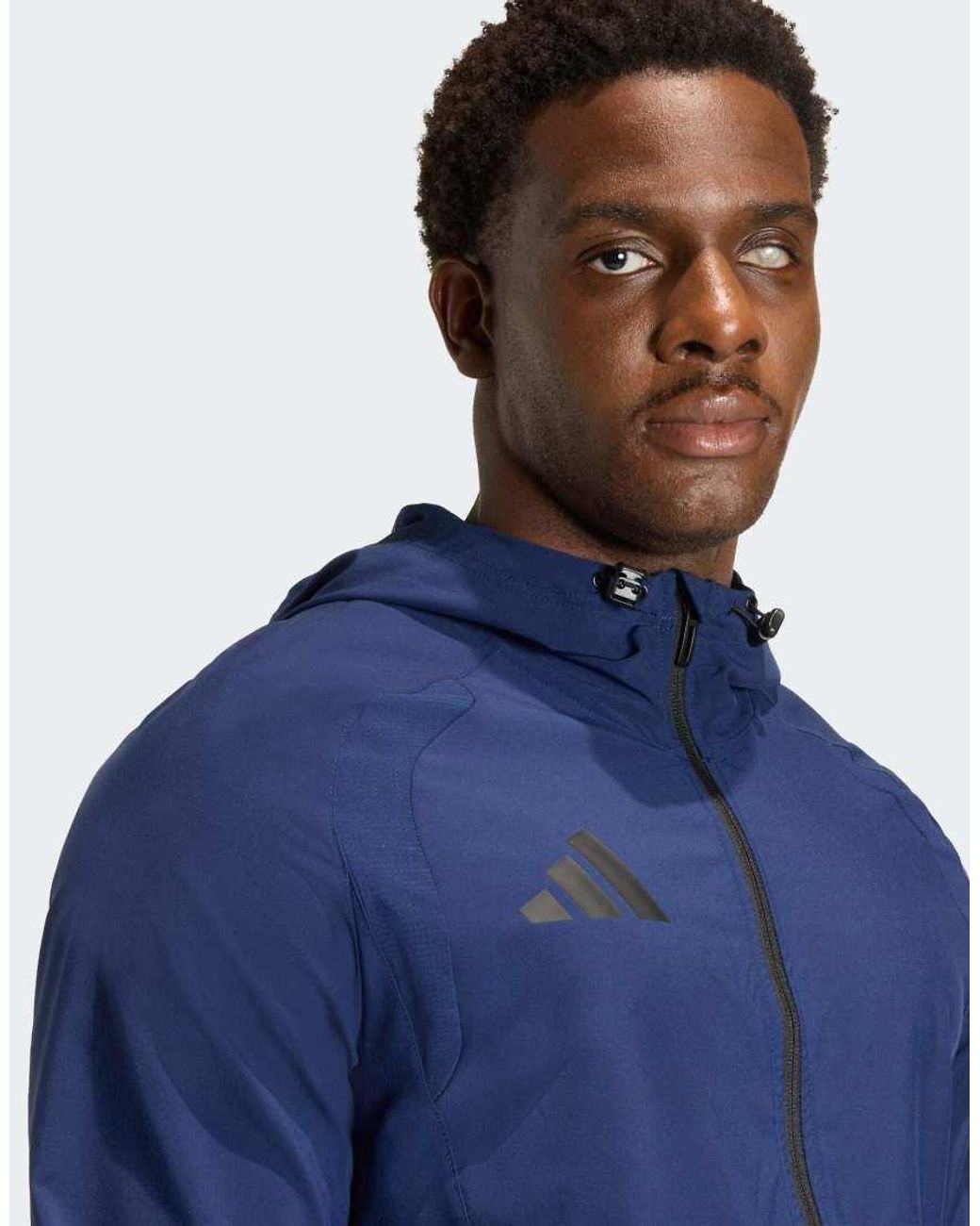 Adidas Originals Blue Tiro Travel Windbreaker Jacket for men