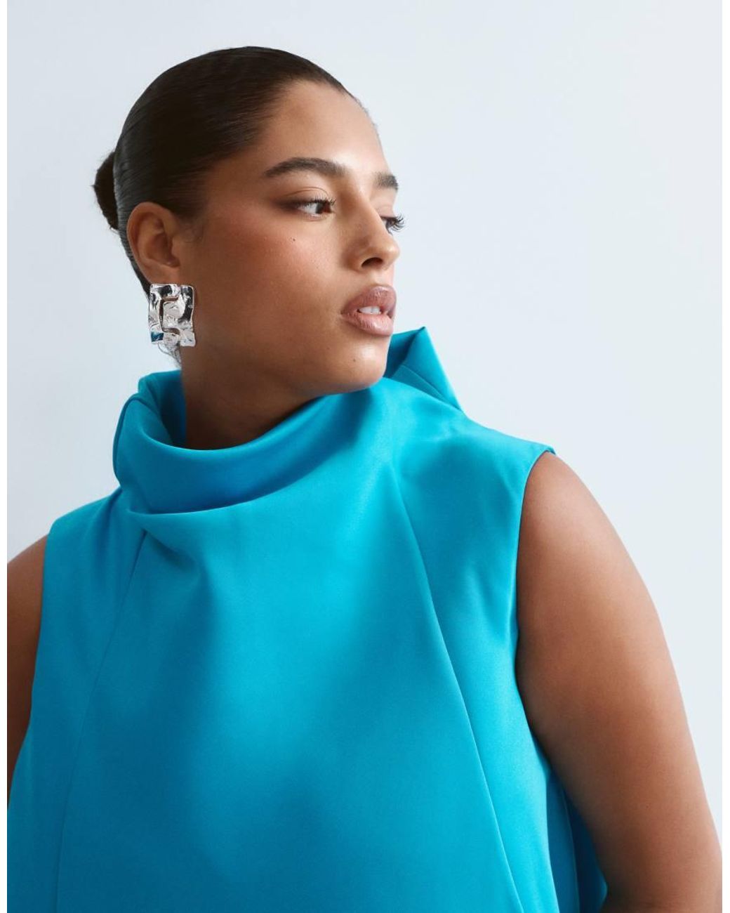 ARRANGE Blue Curve Cowl Neck Asymmetric Dress