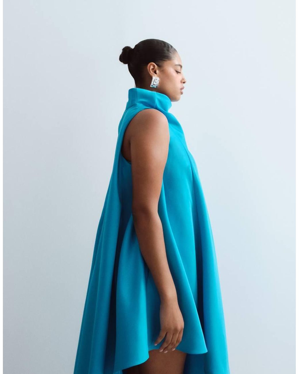 ARRANGE Blue Curve Cowl Neck Asymmetric Dress