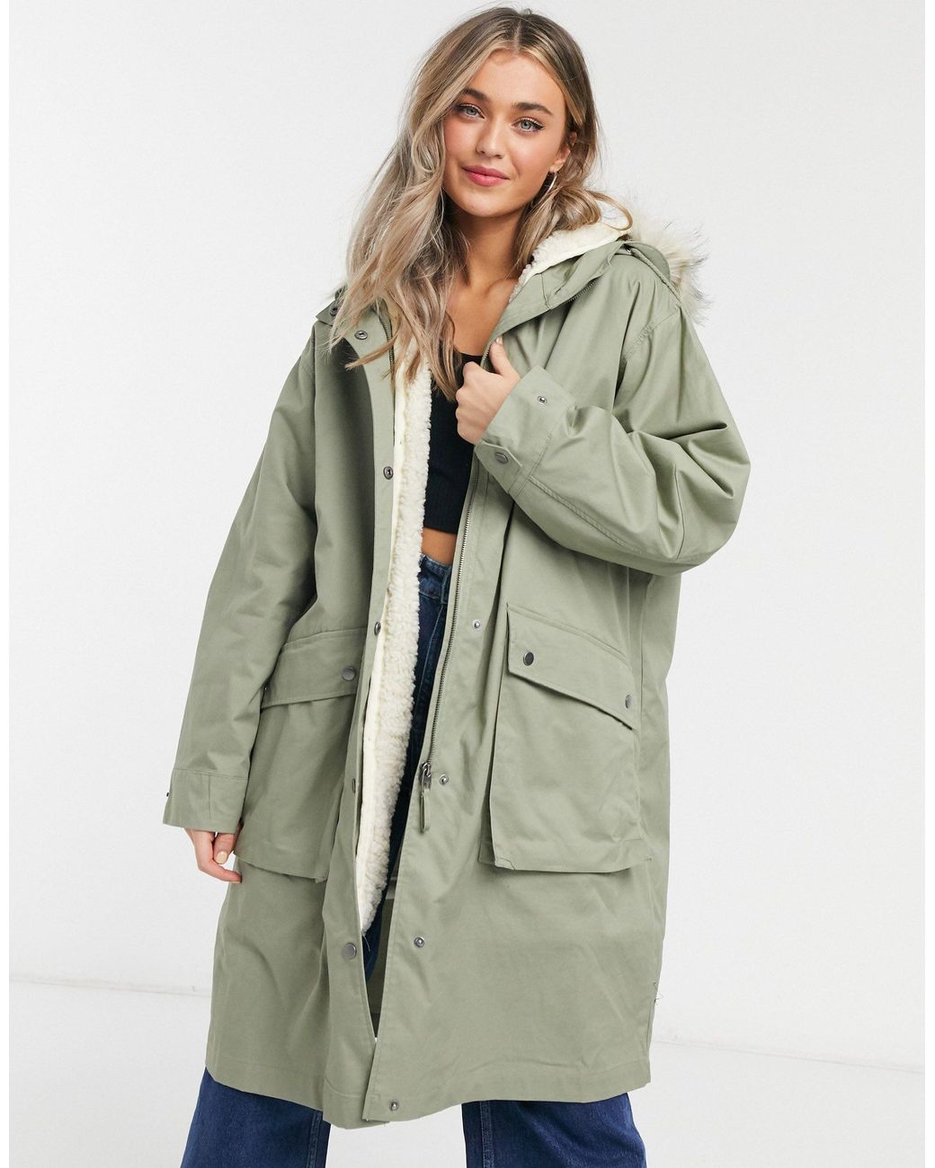 black jumper with rainbow stripe