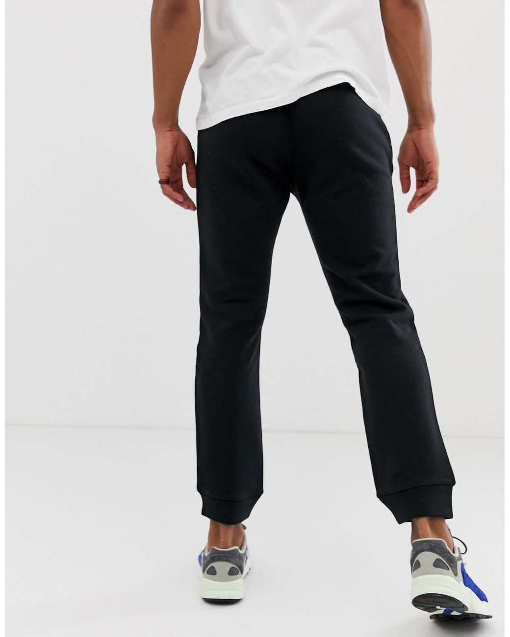adidas originals joggers with logo embroidery grey