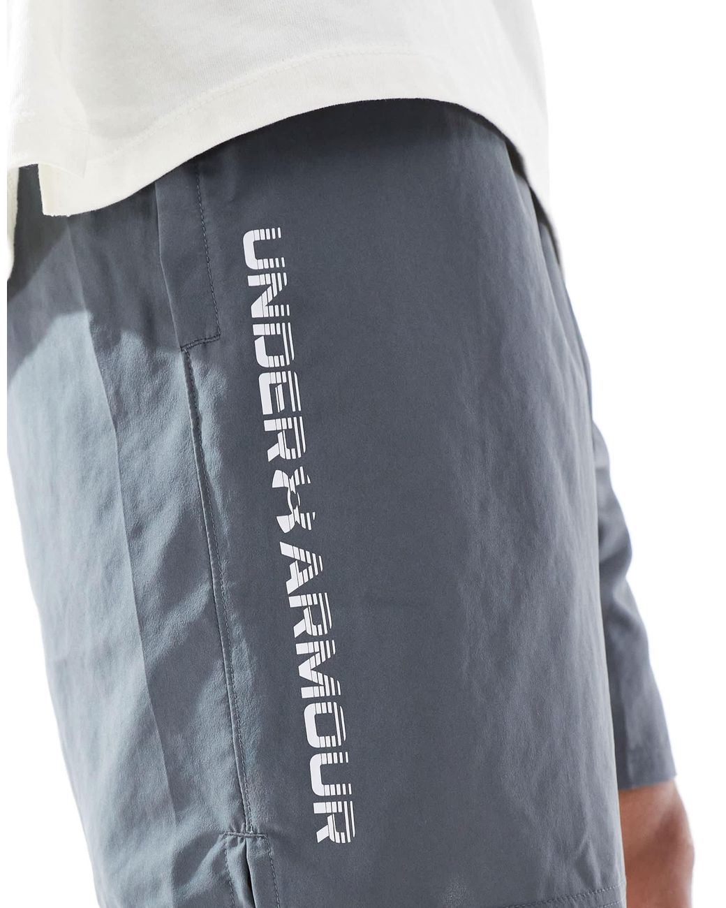 Short technique à logo Under Armour pour homme en coloris Blue