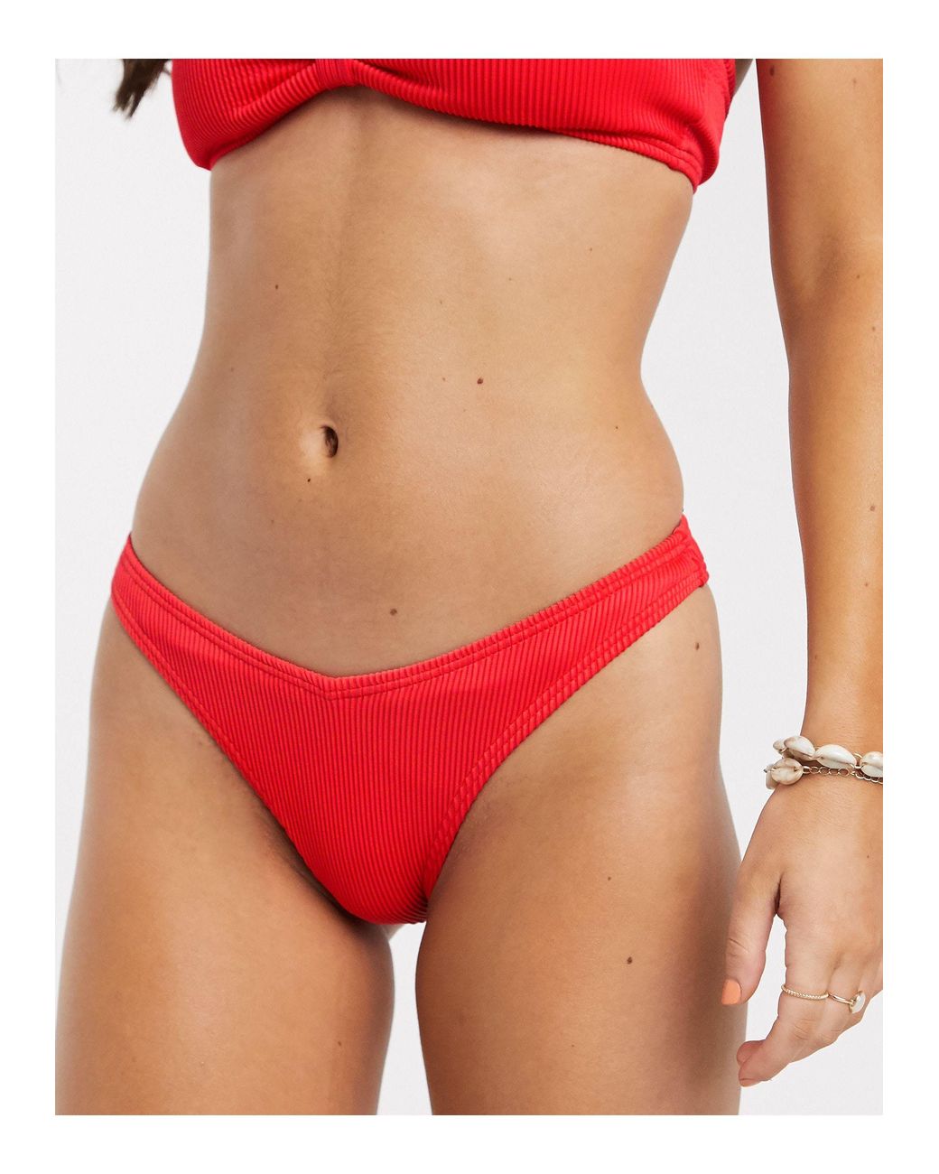 accessorize red swimsuit