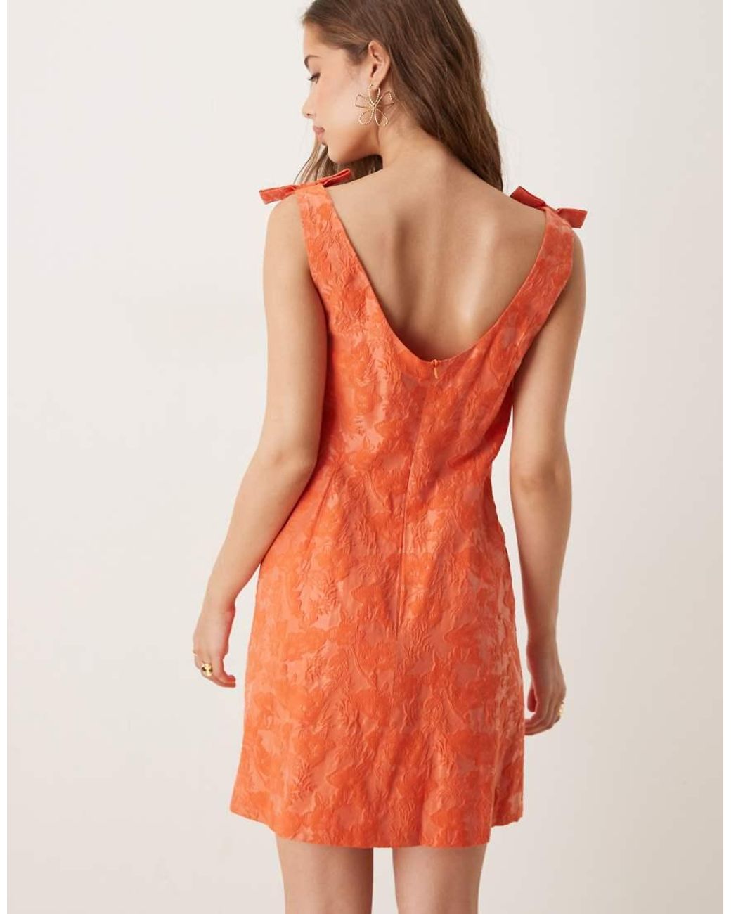 Sister Jane Orange Bow Shoulder Jacquard Mini Dress