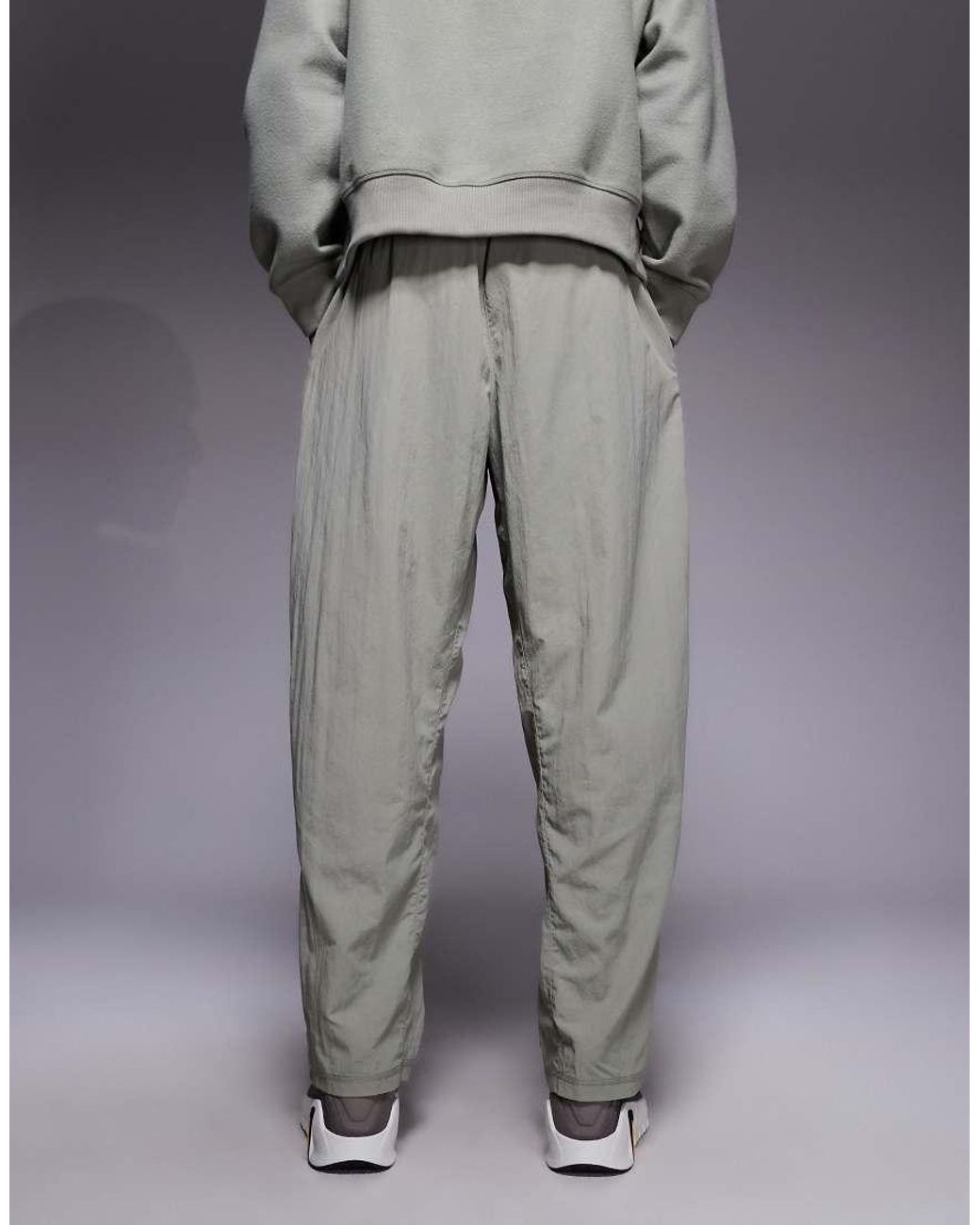 Nike Gray Athletic Club Badge Logo Track Pants for men