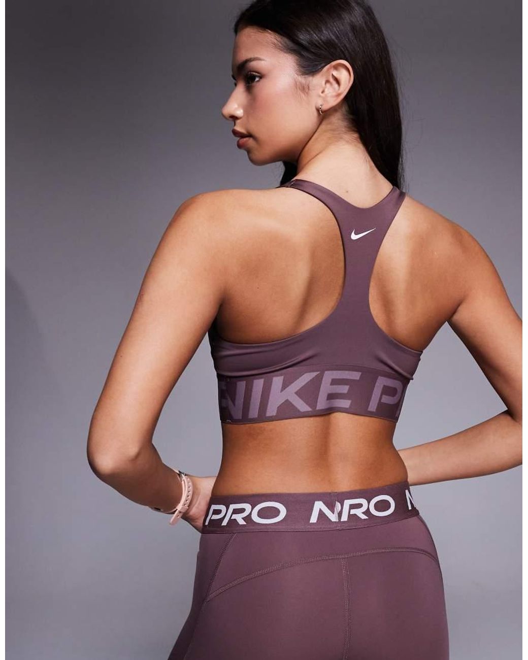 Nike di Nike in Purple