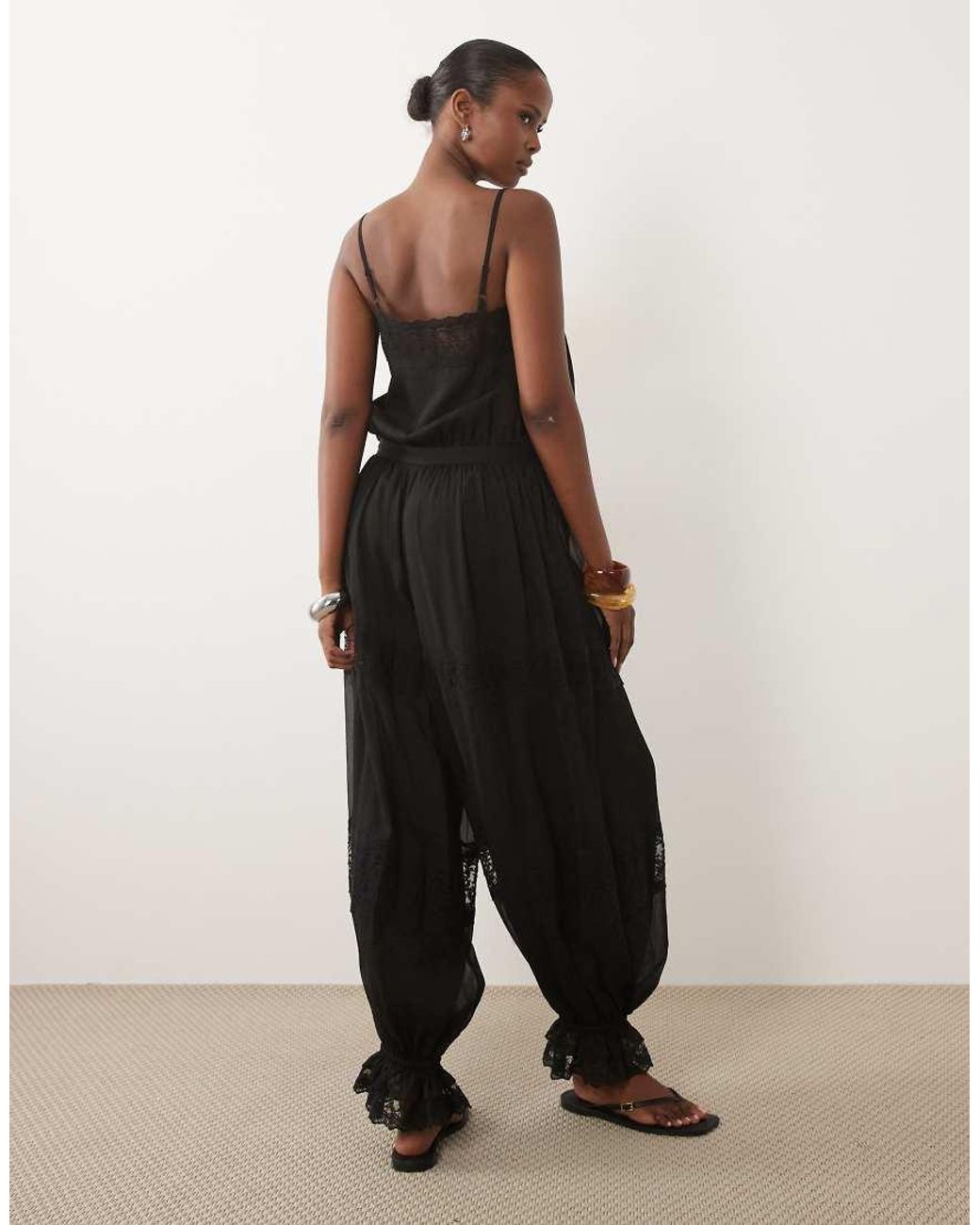 ASOS Black Sheer Lace Jumpsuit With Bubble Hem