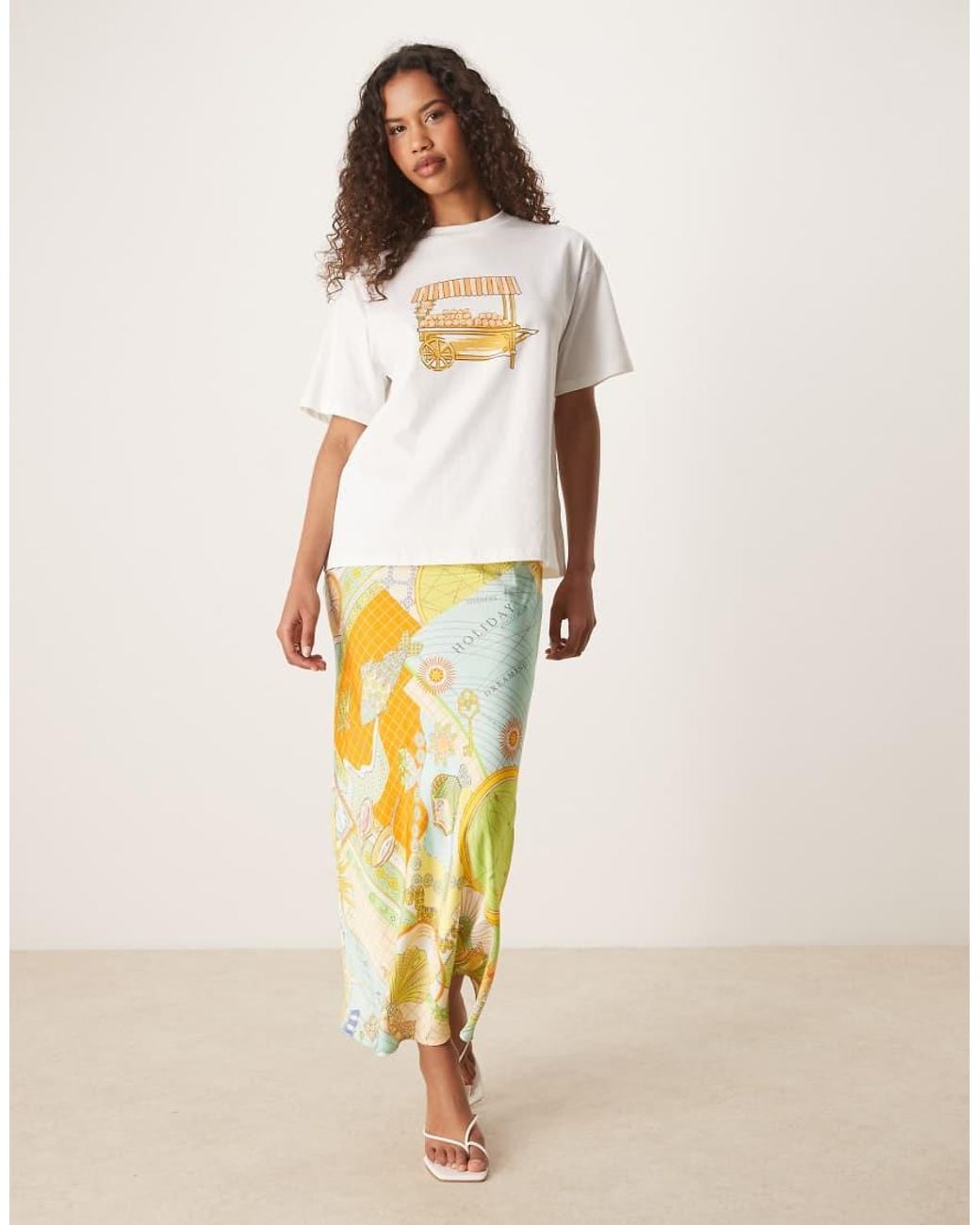 Never Fully Dressed White Orange Cart Baby Tee