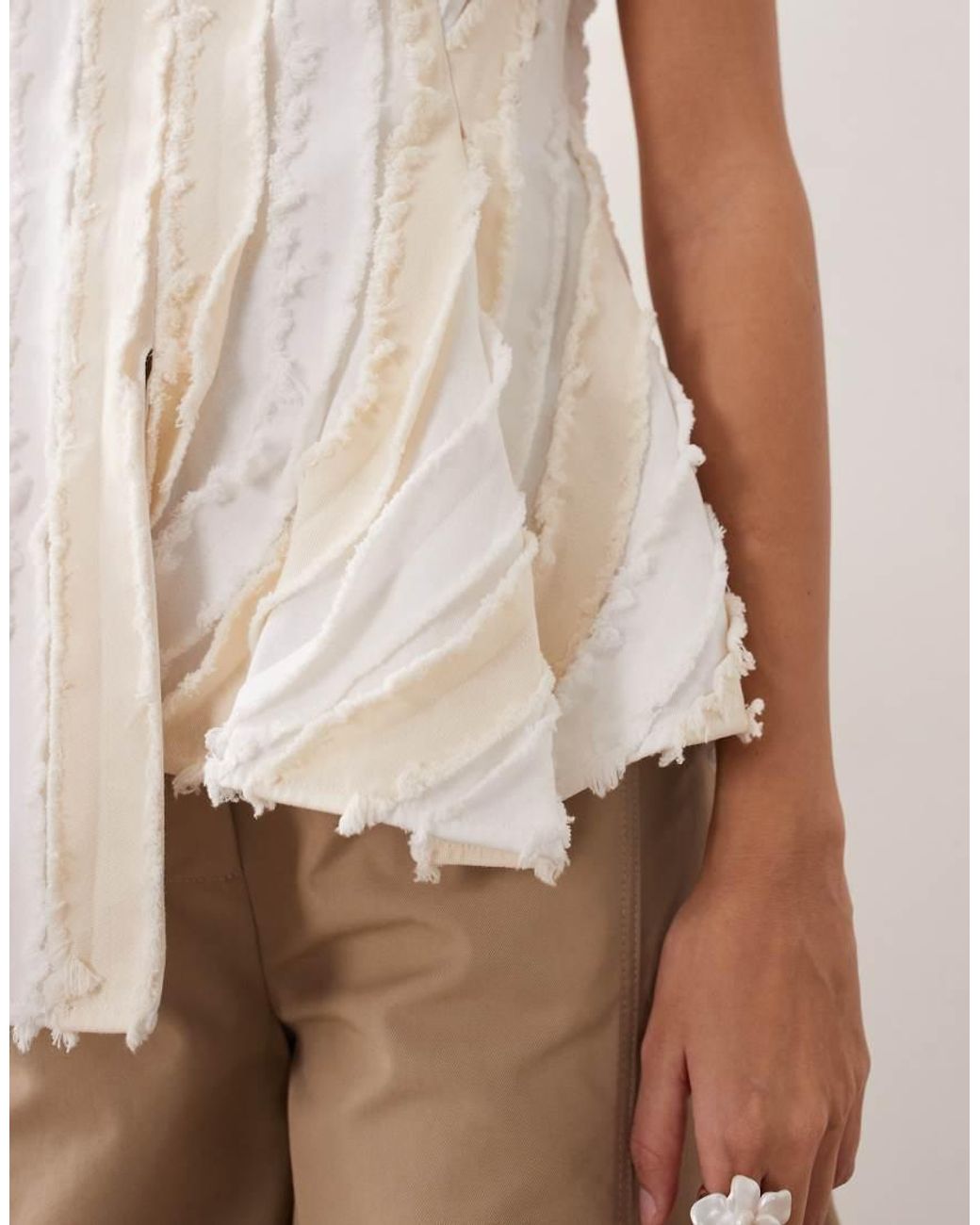 ARRANGE Natural Sleeveless Raw Edge Pleated Top