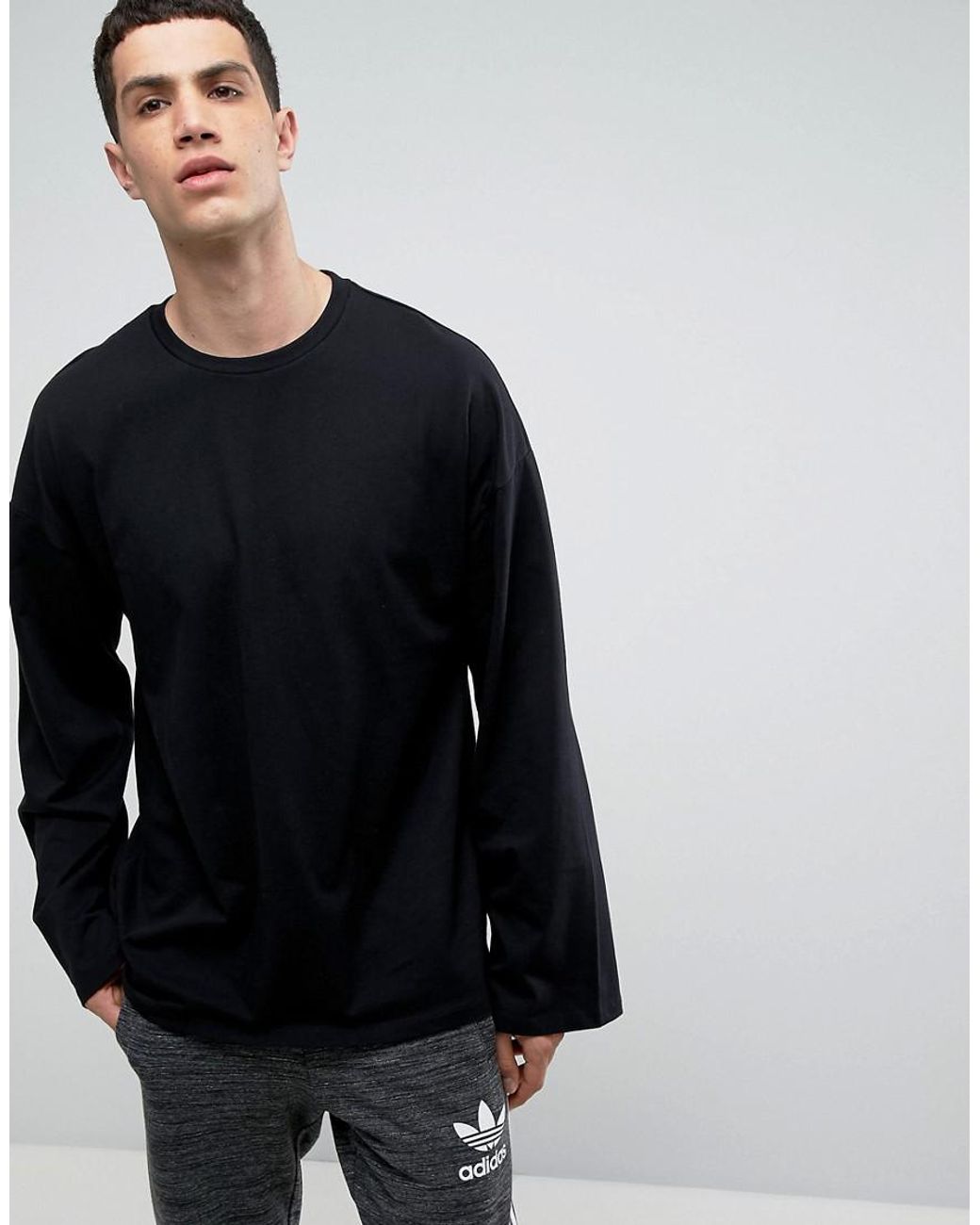 Oversized black long sleeve shirt top
