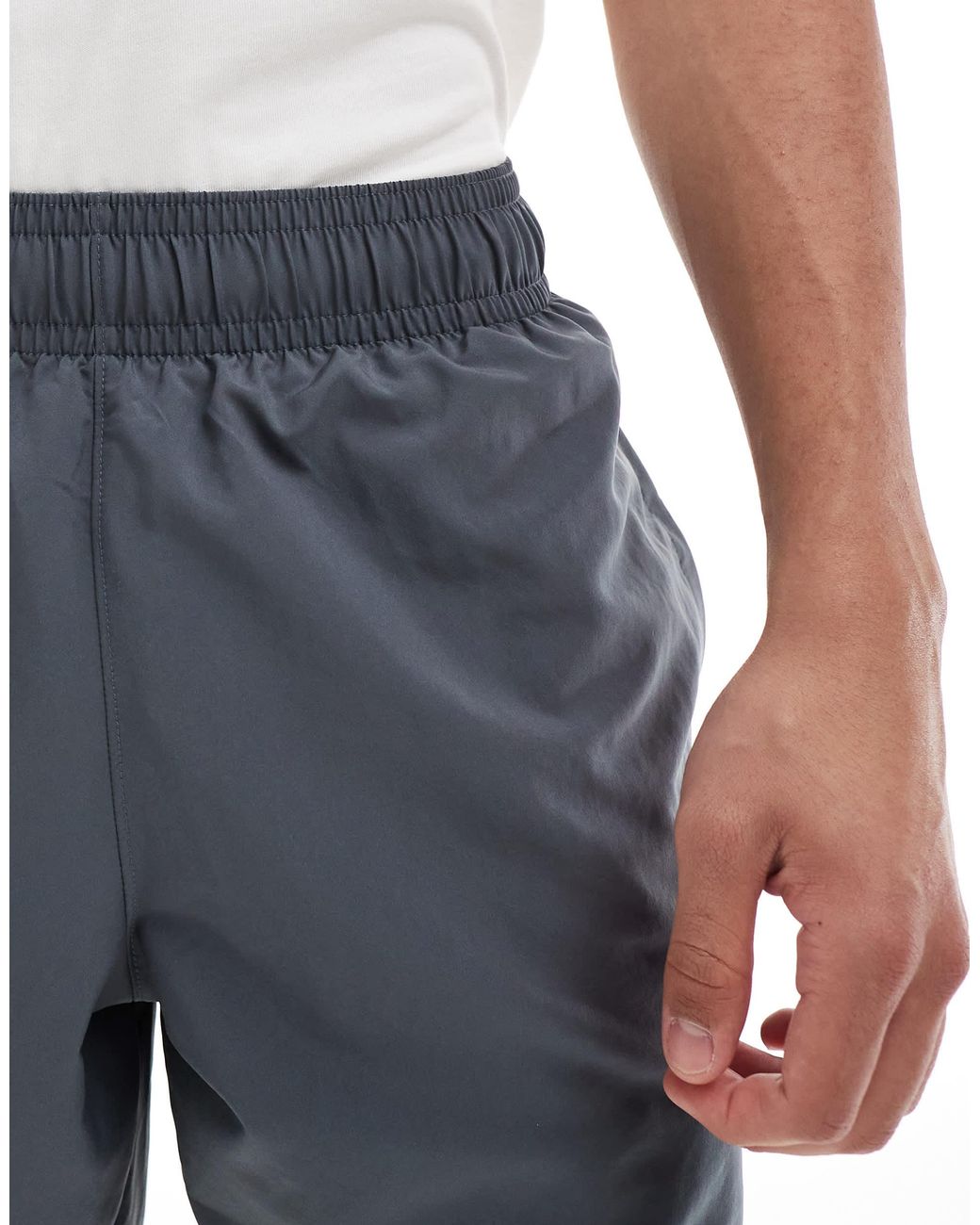 Short technique à logo Under Armour pour homme en coloris Blue