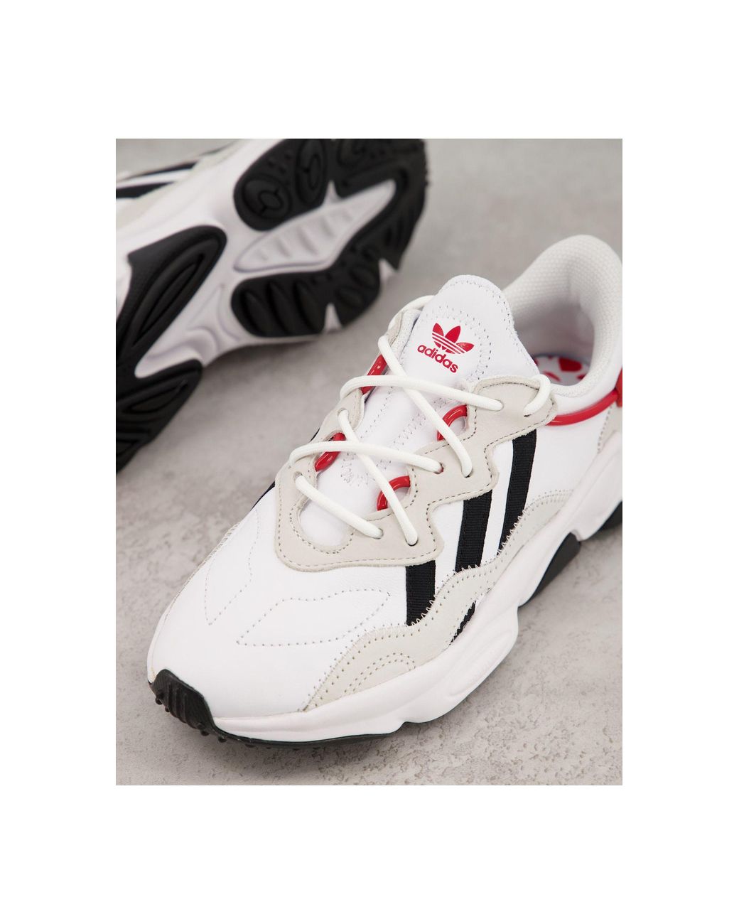 Ozweego blanche jaune sale