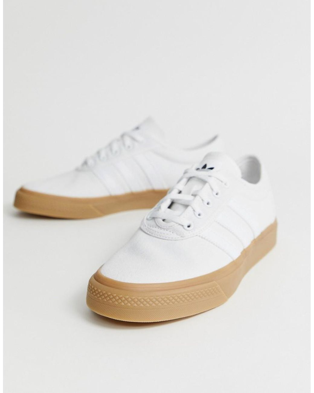 adidas Originals Adi ease Trainers In White With Gum Sole for Men Lyst UK