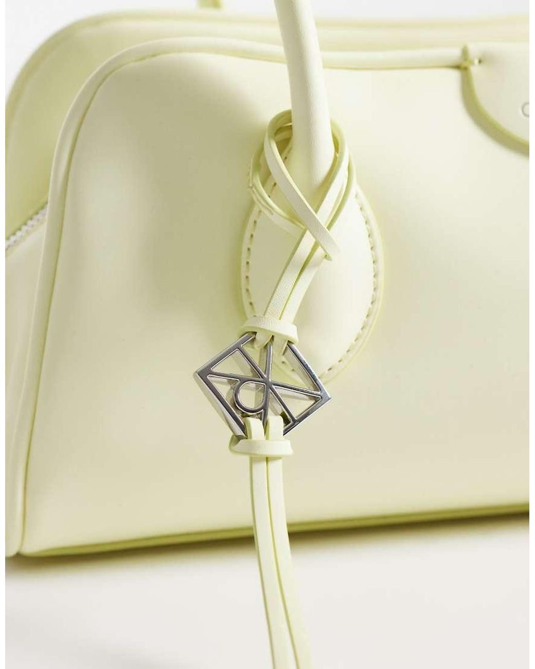 Calvin Klein Natural Emblem Grain Texture Shoulder Bag With Hardware Charm