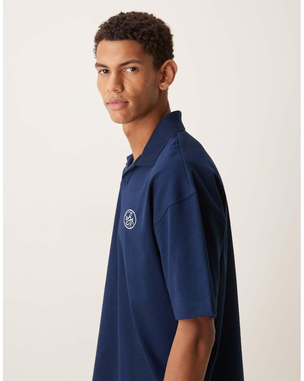 ASOS Blue Circular Design Collection Super Heavyweight Oversized Polo With Chest Print for men