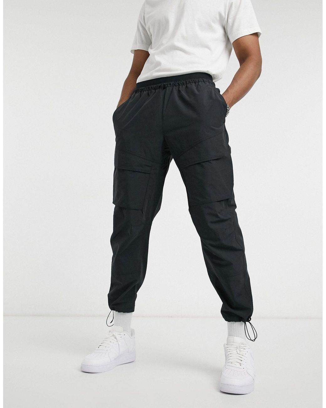 nike repeat pack jogger cargo à bande logo gris fer