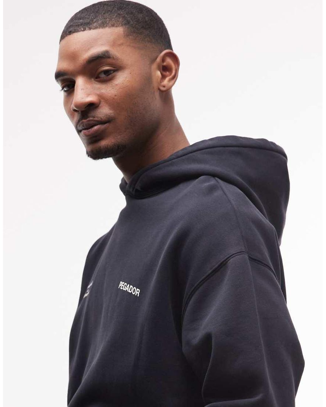 PEGADOR Black Rochefort Oversized Hoodie With Back Print Graphic for men