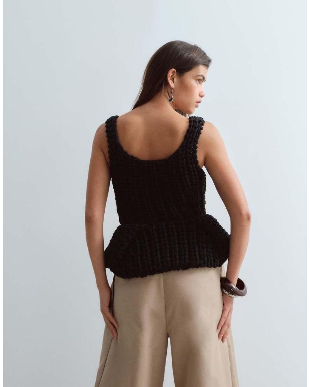 ARRANGE Black Chunky Hand Knit Peplum Top