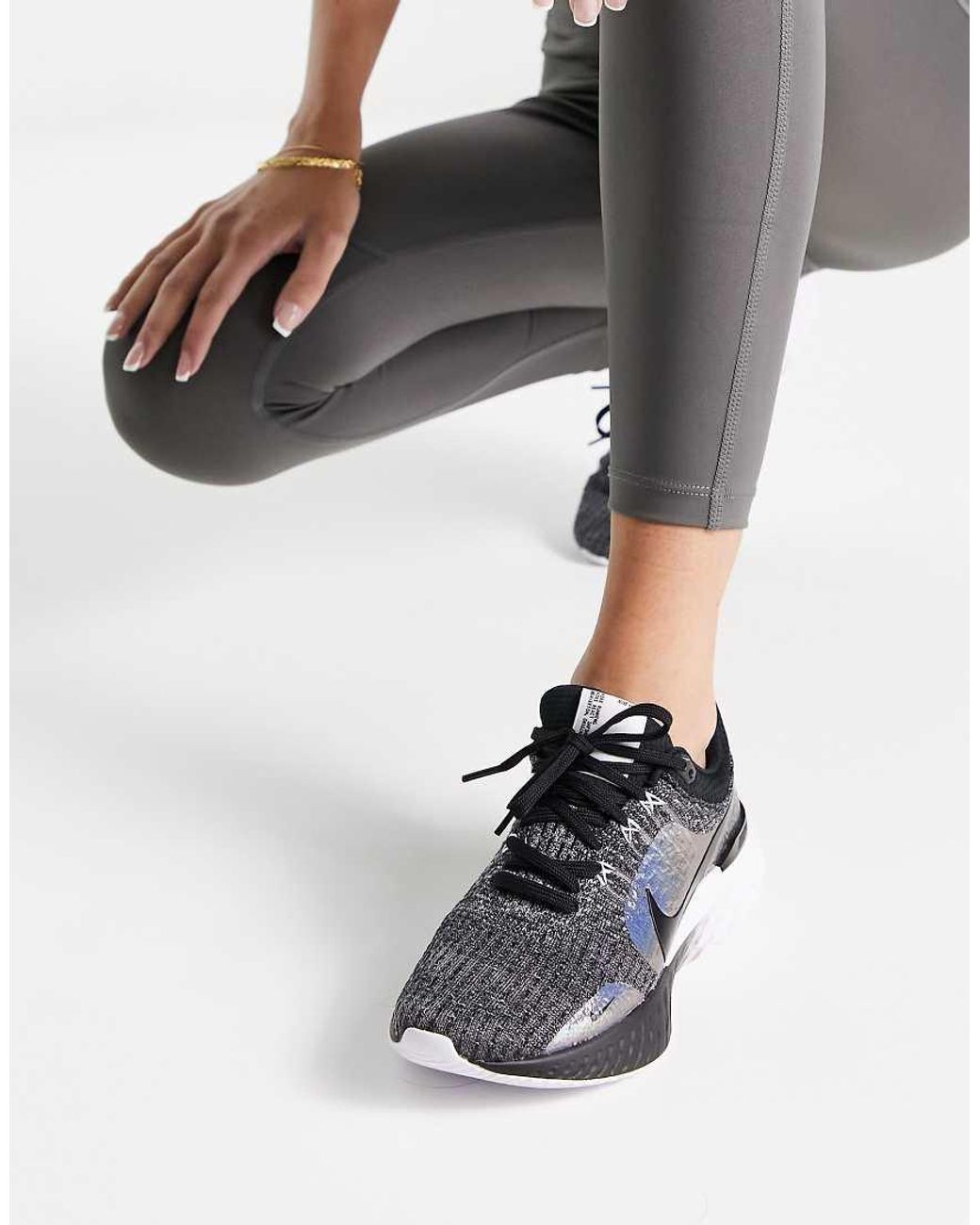 nike black knitted trainers