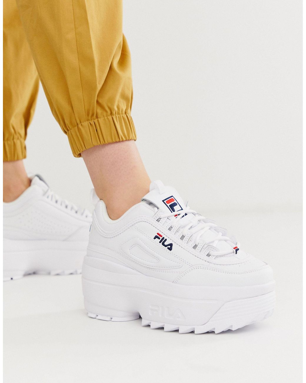 Zapatillas blancas con cuña y plataforma disruptor ii Fila de color Blanco  | Lyst
