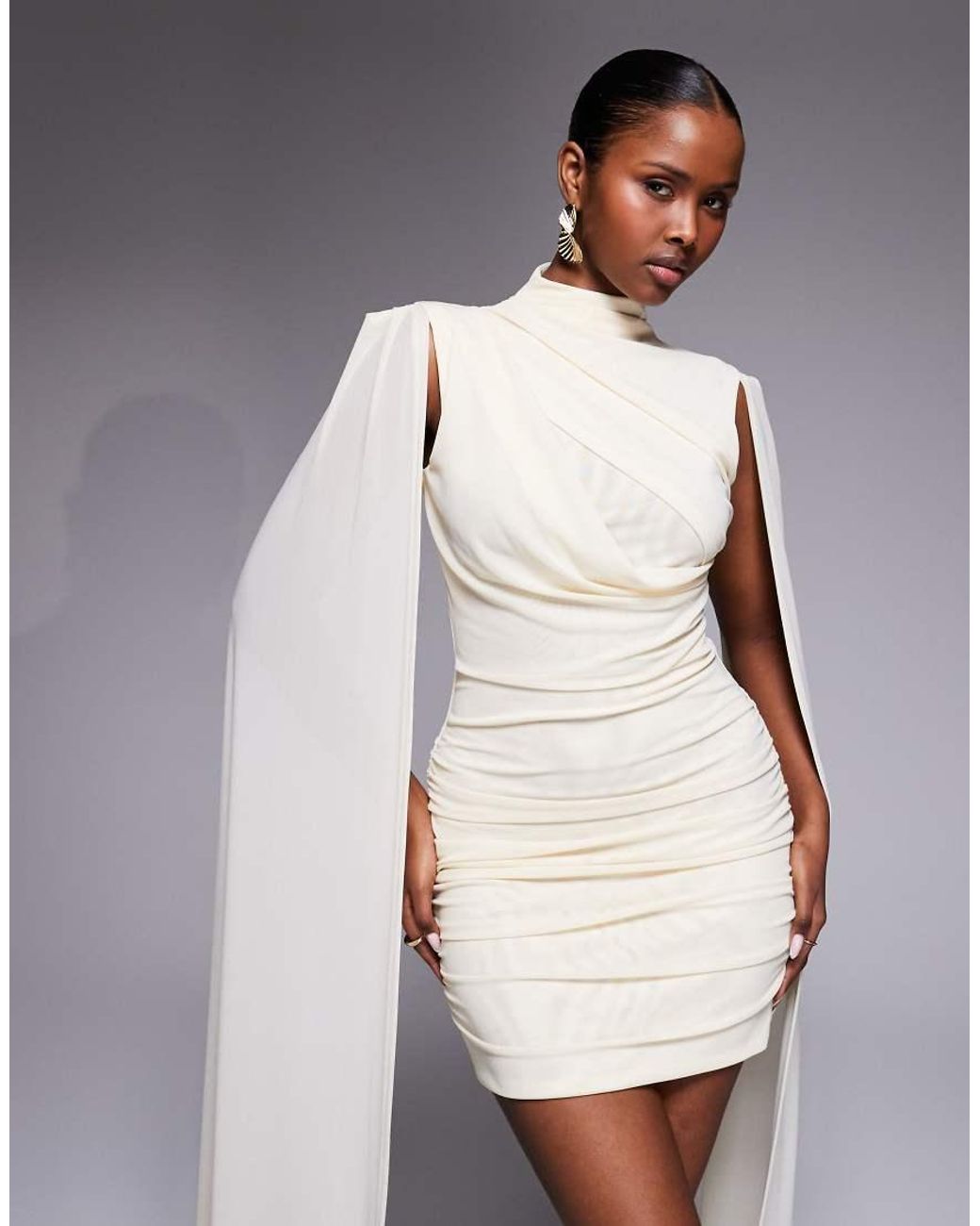 Ruched & Ready Yellow Sculpting Mock Neck Mesh Cape And Twisted Skirt Detailing Mini Dress