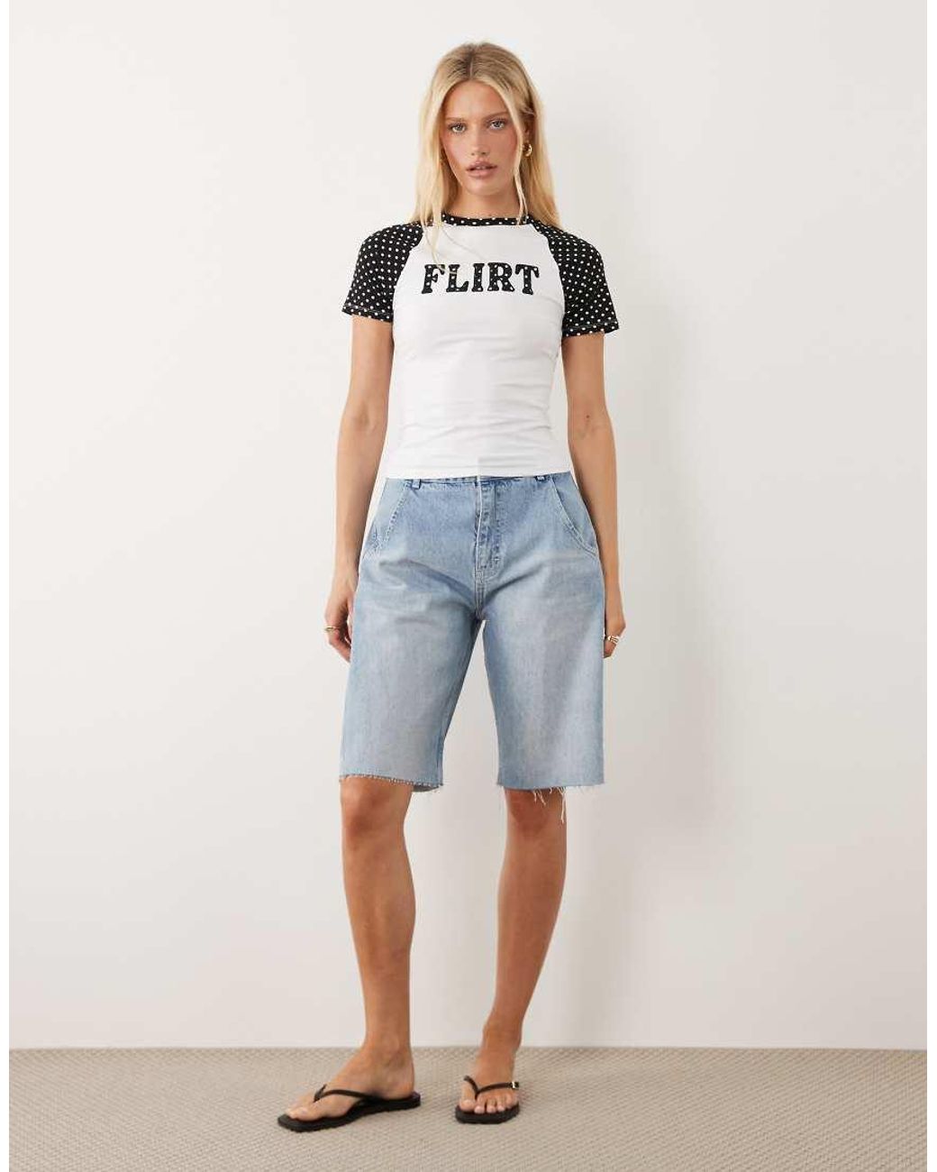 ASOS White Contrast Raglan Sleeve Baby Tee With Flirt Slogan