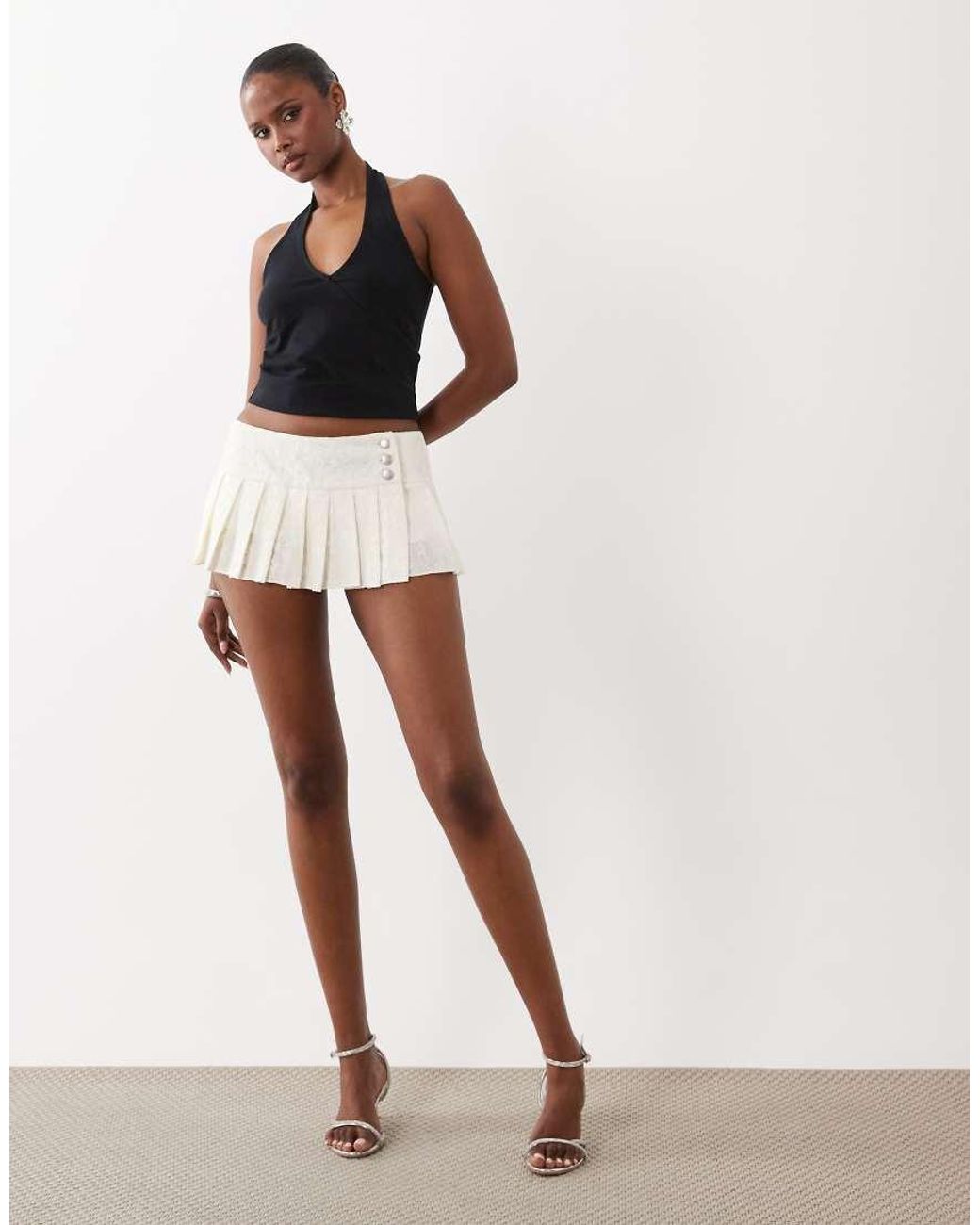 I.AM.GIA White Remini Button Detailing Dropped Waist Pleated Lace Mini Skirt