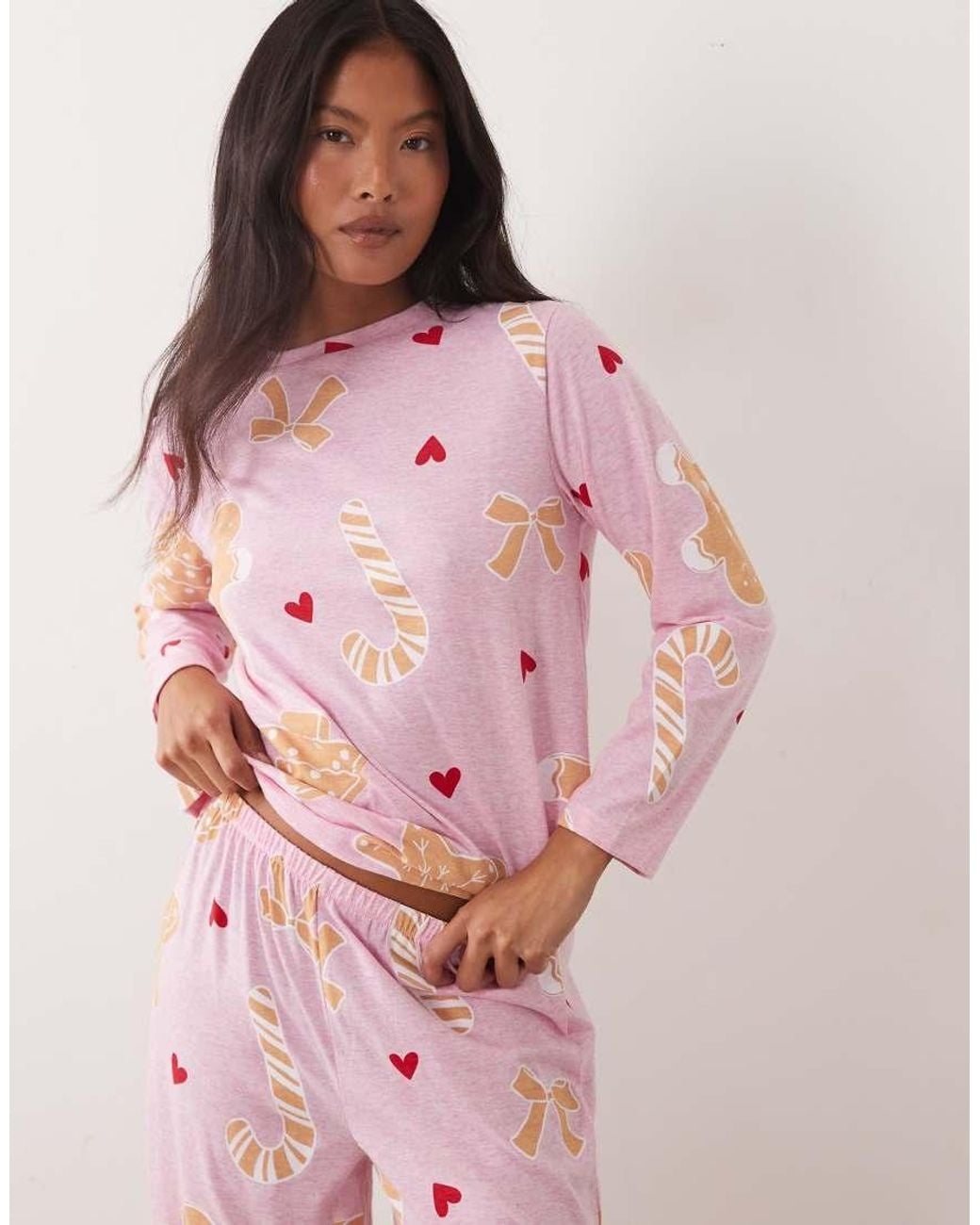 ASOS Pink Asos Design Petite Long Sleeve Top & Wide Leg Trouser Pyjama Set With Sweets Graphic
