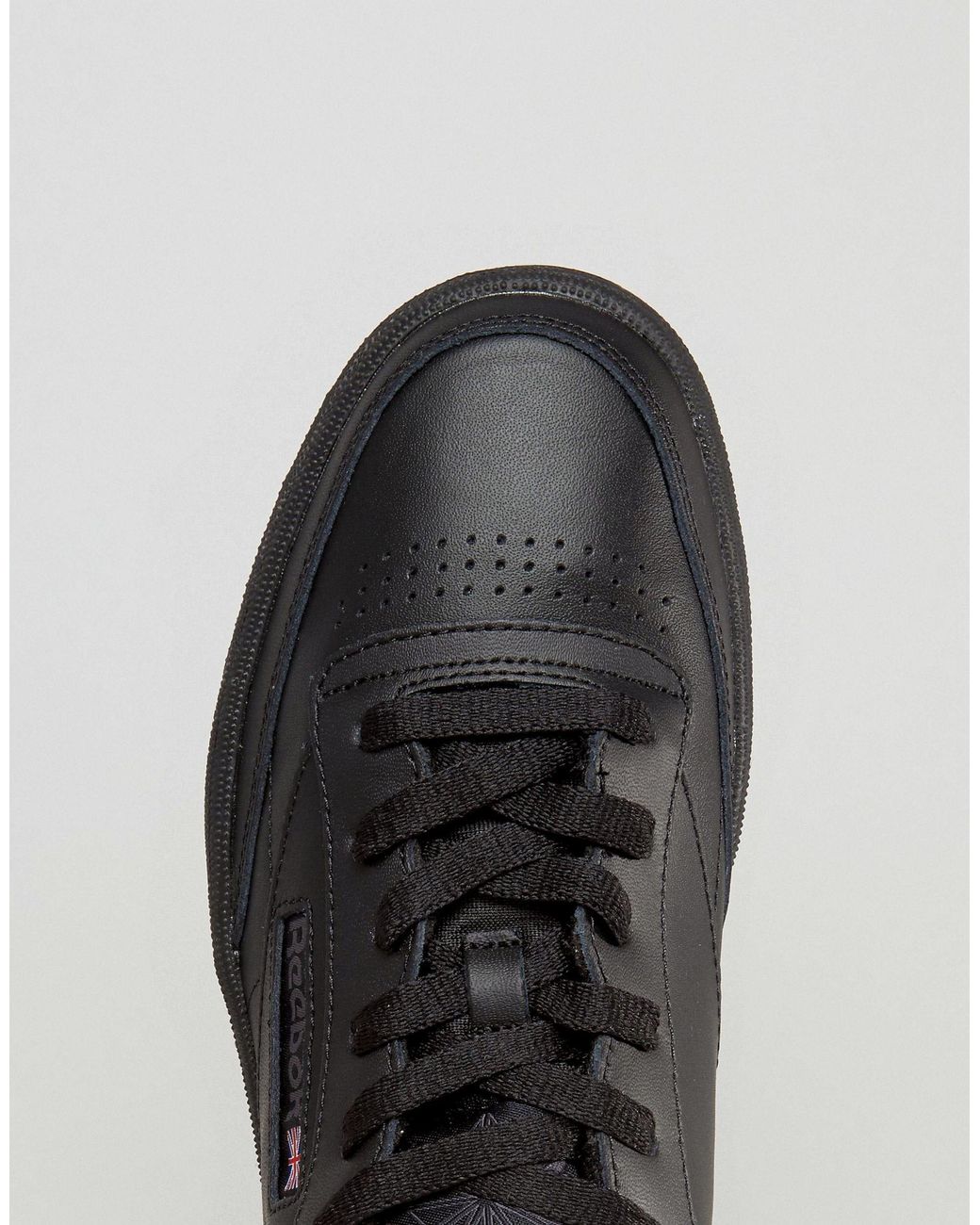reebok club c leather trainers in black