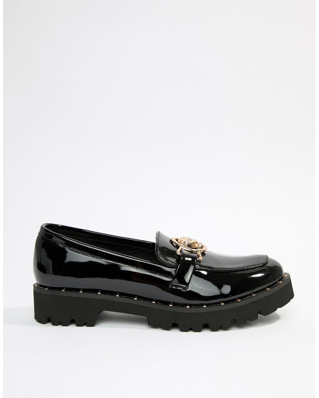 Glamorous black chunky flat shoes with gold lion best sale trim