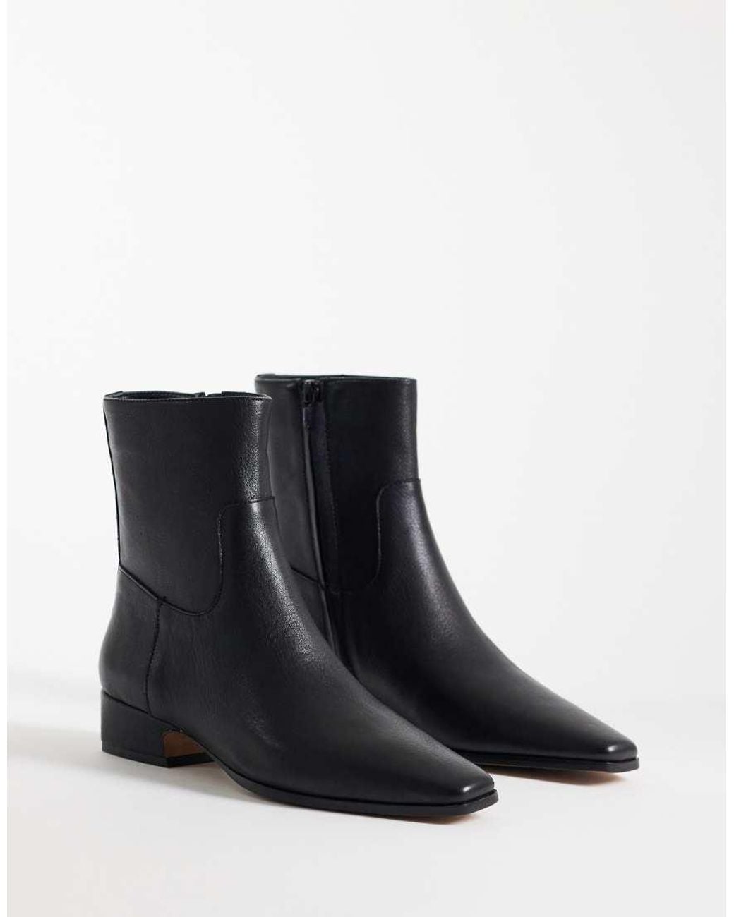 Steve Madden Black Dusty Flat Mid Ankle Boots
