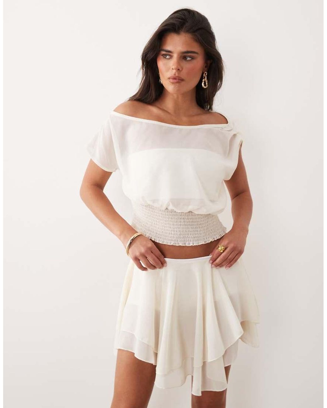 The Frolic Natural Exclusive Chiffon Drape Off Shoulder Shirred Waist Top