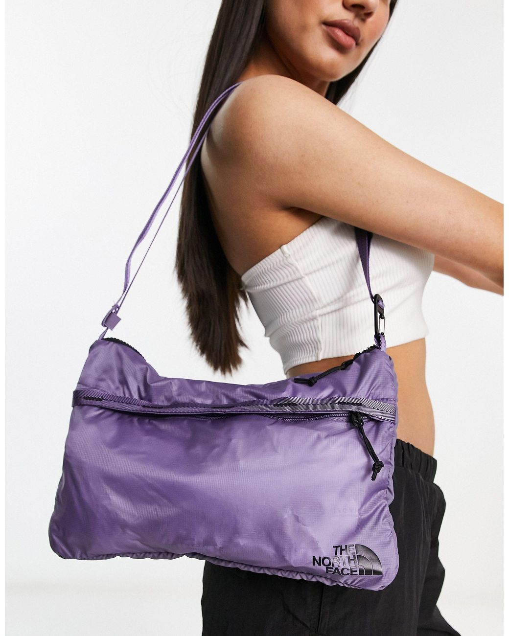 The North Face Flyweight Shoulder Bag in Purple Lyst UK