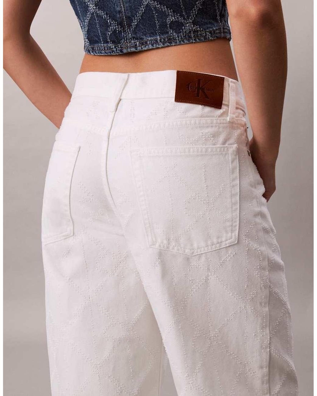 Calvin Klein Multicolor Laser Cut Repeat Logo Low Rise baggy Jeans