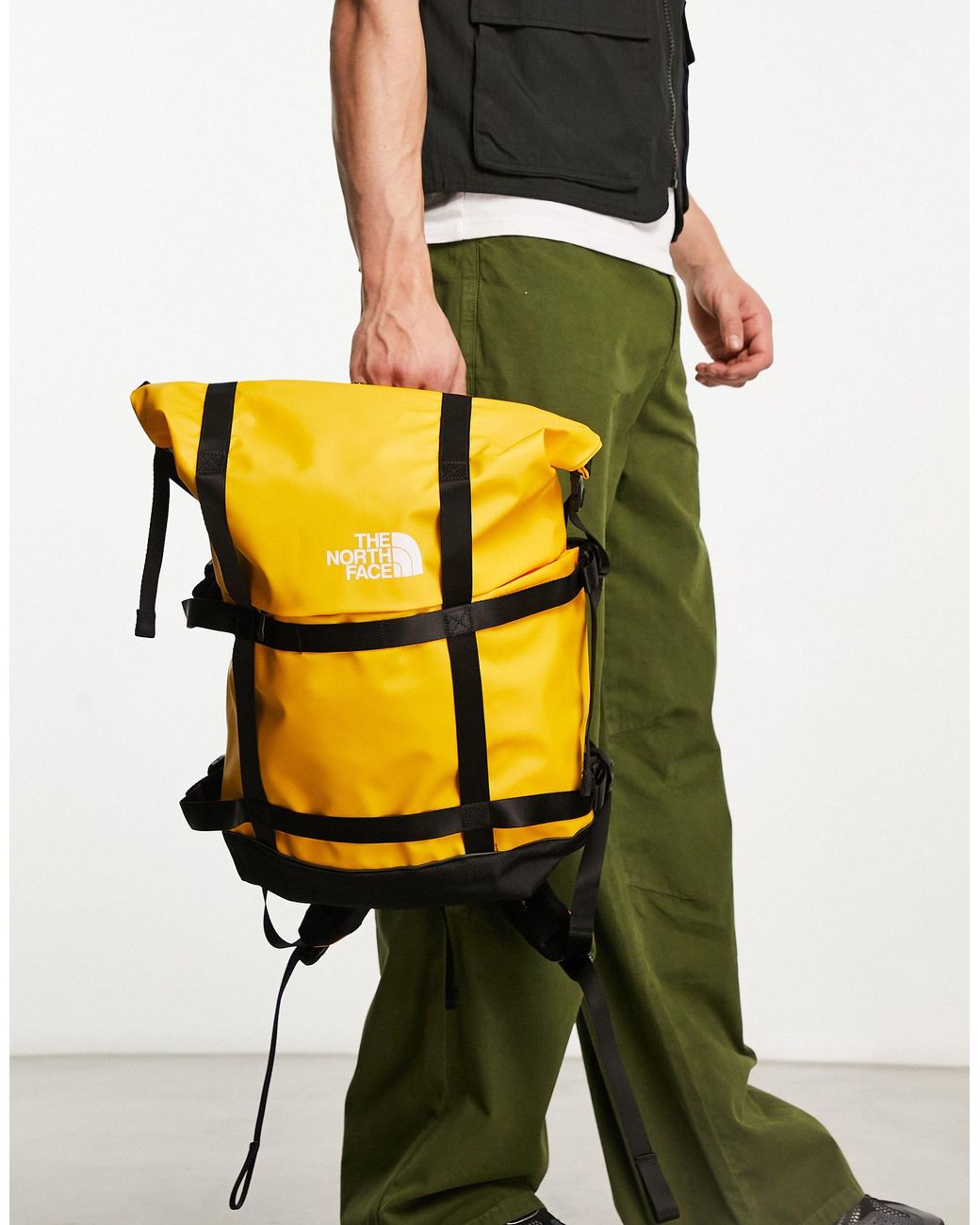 The North Face Commuter Roll Top Backpack in Yellow for Men | Lyst Australia