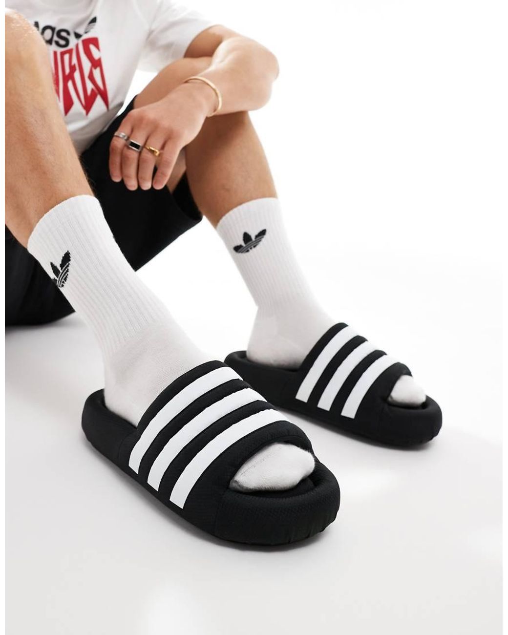 white adidas sliders