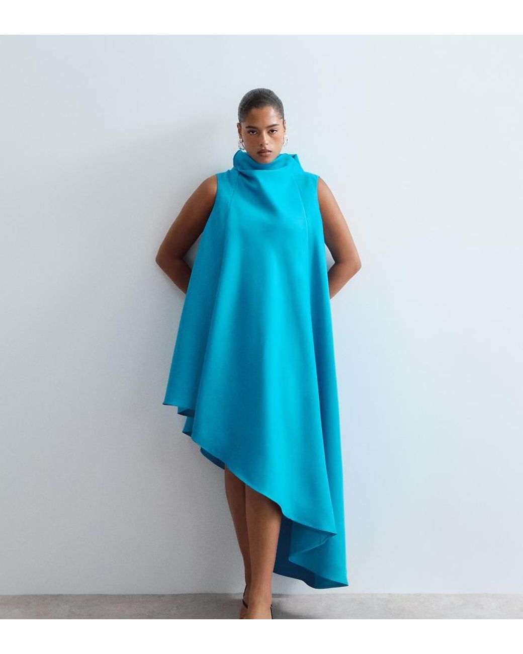 ARRANGE Blue Curve Cowl Neck Asymmetric Dress