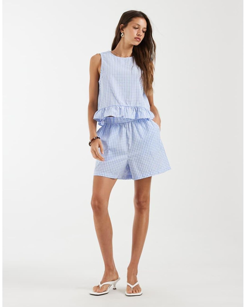 Pieces Blue Sleeveless Top With Frill Hem